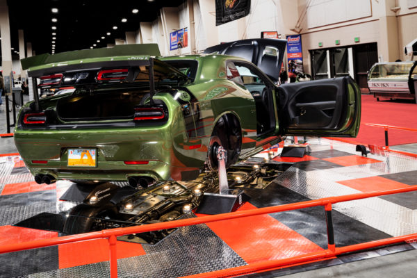 A Petty Hellcat on display at a car show on a floor with RaceDeck pro
